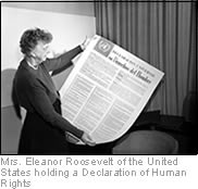 Mrs. Eleanor Roosevelt of the United States holding a Declaration of Human Rights